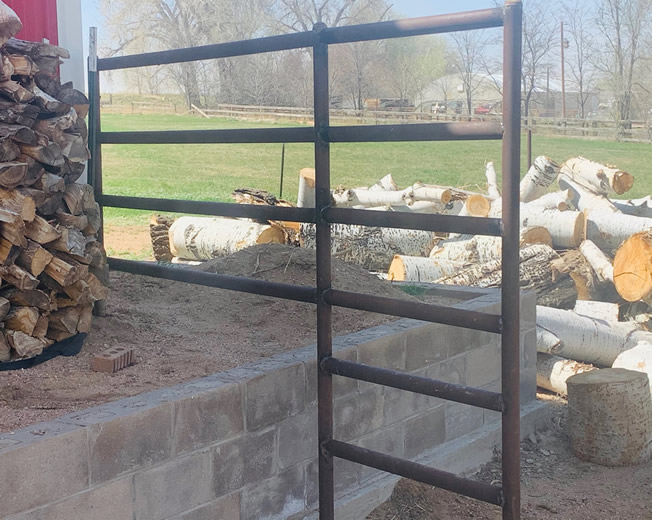 2 3/8" Drill Step Pipe makes strong fence and is customizeable to your needs. Construction by Integrity Welding Service LLC, servicing the Front Range of Colorado.